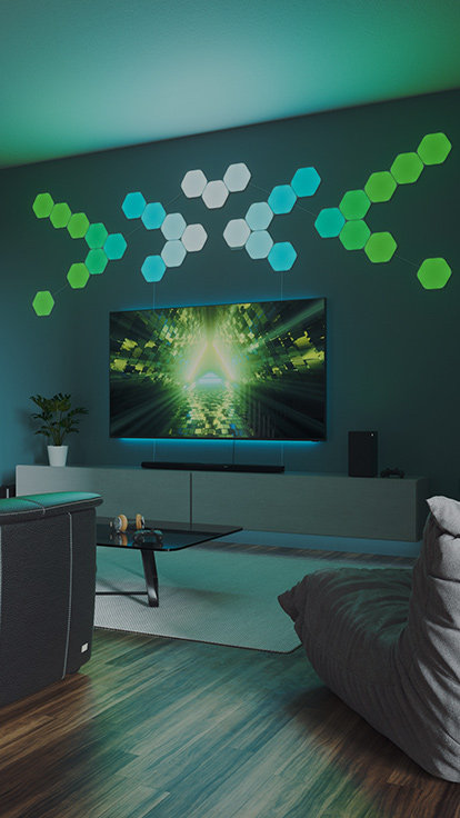 リビングのTVの後ろの壁のNanoleaf Shapes Hexagonsの画像です。 RGBライトパネルがリンカーとフレックスリンカーで接続されています。