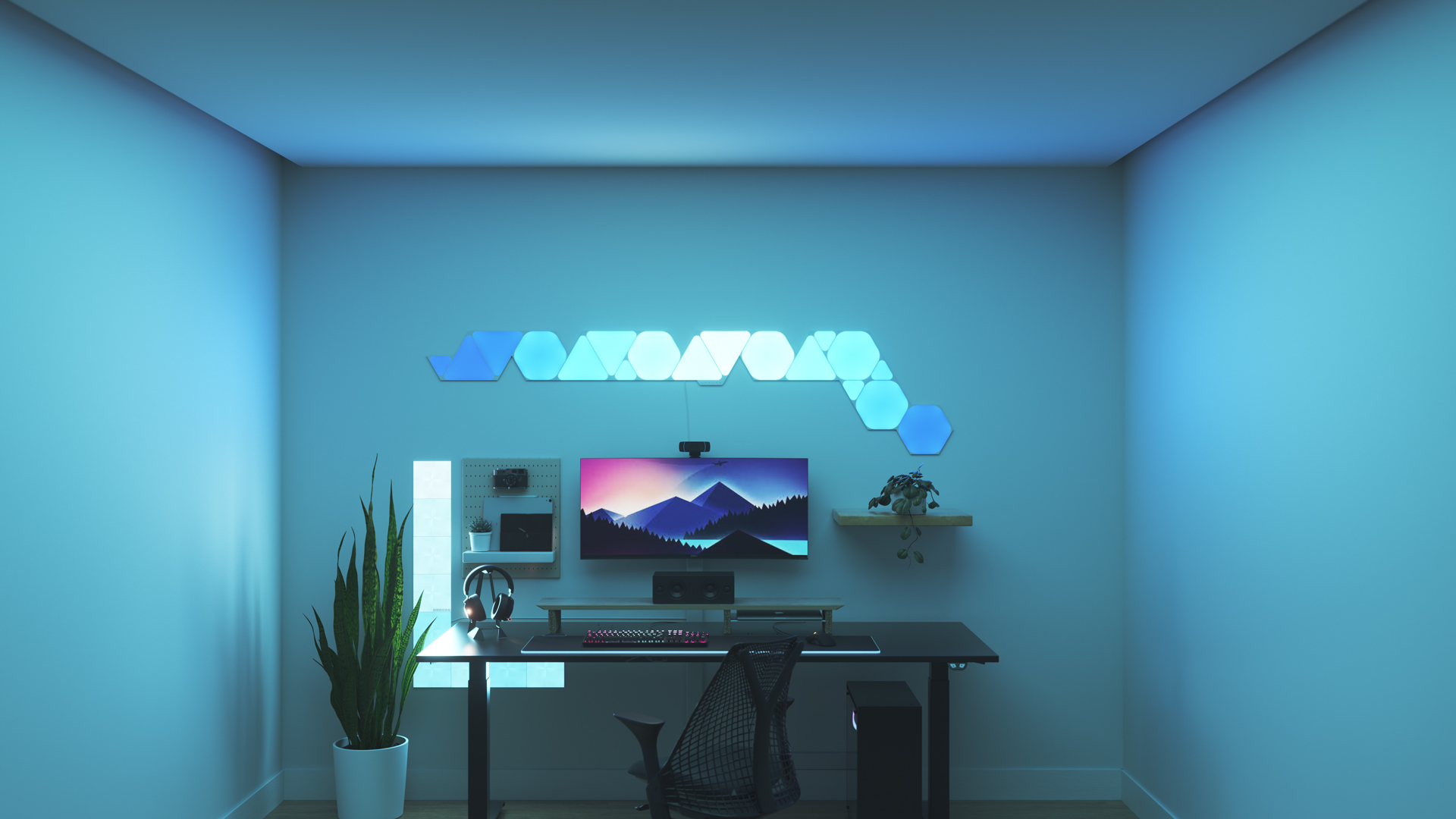 Minimalistic style gaming setup with Nanoleaf Shapes smart home RGB light panels above the monitor. PC games are better with these gaming lights.
