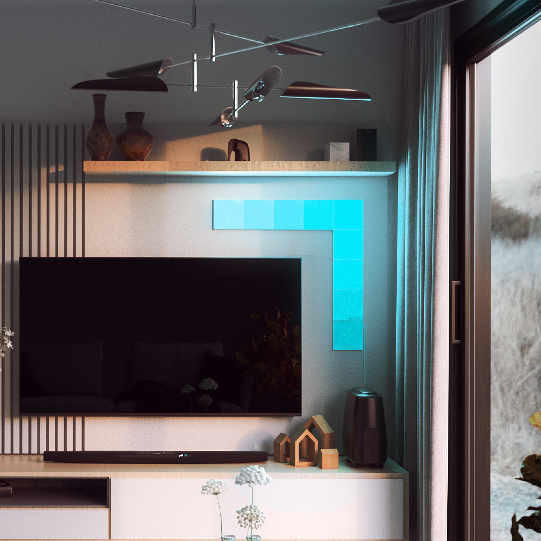 Nanoleaf Canvas color-changing square smart modular light panels mounted to a wall in a living room. Similar to Philips Hue, Lifx. HomeKit, Google Assistant, Amazon Alexa, IFTTT.